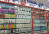 AIMRA mobile retailer protest in ramleela maidan against online exclusive sale india price parity
